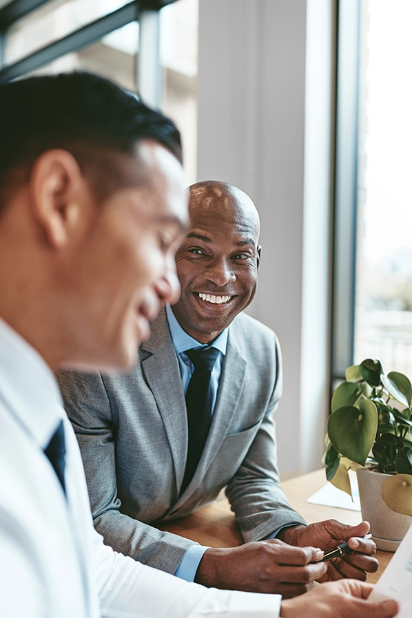 Two work colleagues conversing 